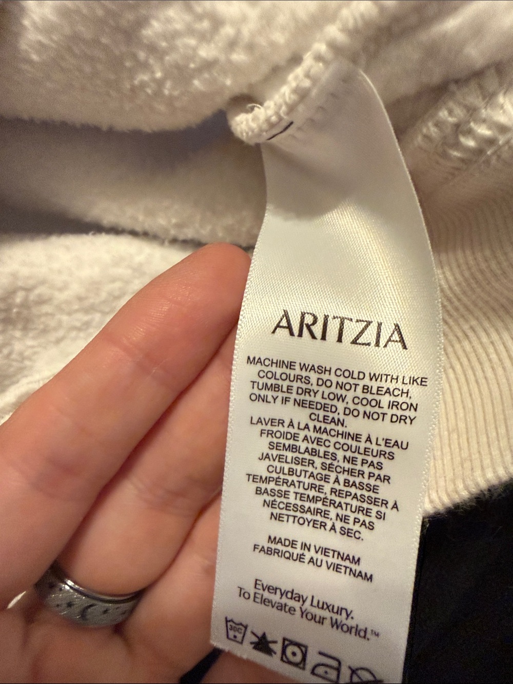 Aritzia Cream Care-Label Hoodie Detail